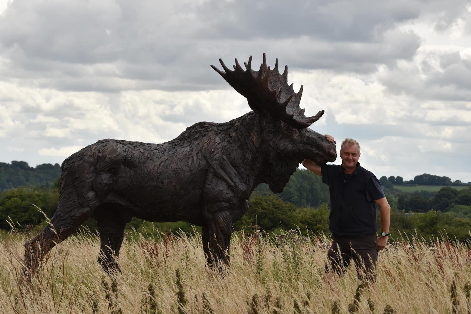 Hamish Mackie with life-size Moose sculpture
