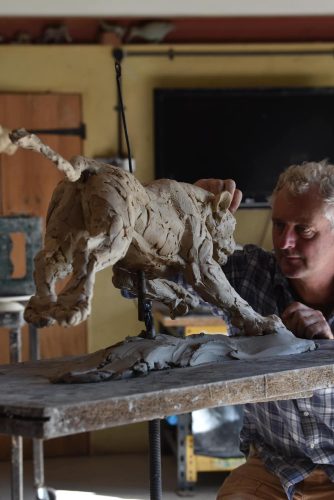 Lioness in mid-hunt clay model