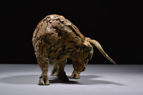 sculpture of bronze highland cow