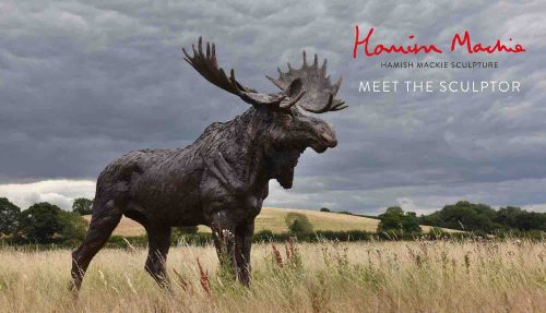 image of moose sculpture in field