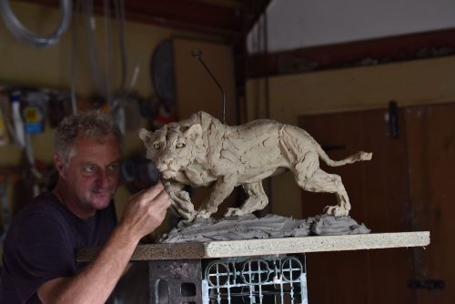 Lioness stalking clay original