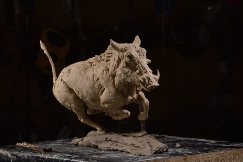 clay original of bronze warthog sculpture