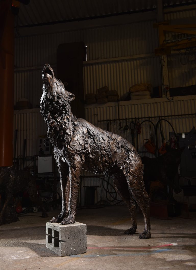Sculpture of male wolf by Mackie