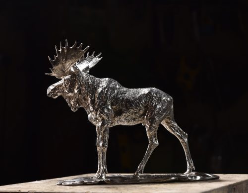 silver moose sculpture by Mackie