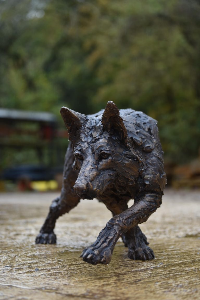 Wolf prowling sculpture by Mackie