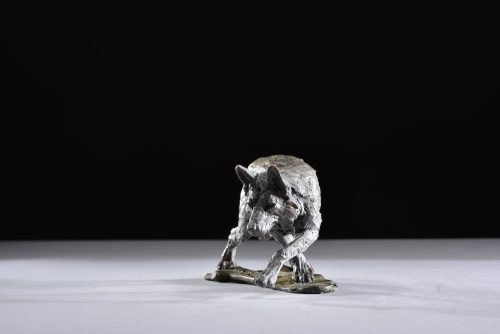 wolf prowling scaled sculpture