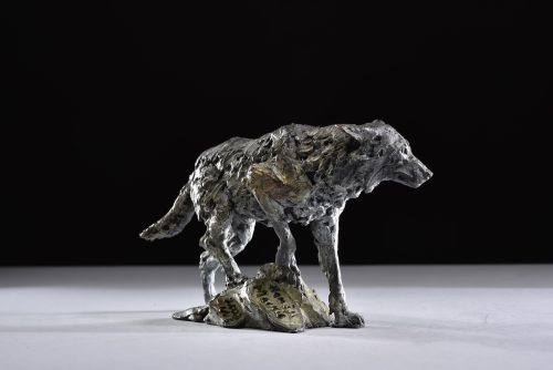 scaled wolf sculpture