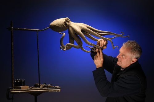 Mackie making octopus sculpture