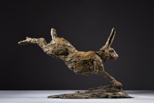 sculpture of hare running