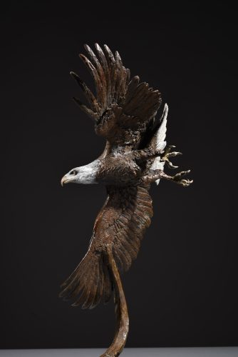 bronze scaled sculpture of bald eagle