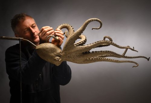 Hamish making octopus sculpture