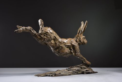 bronze sculpture by Hamish Mackie of Hare Running