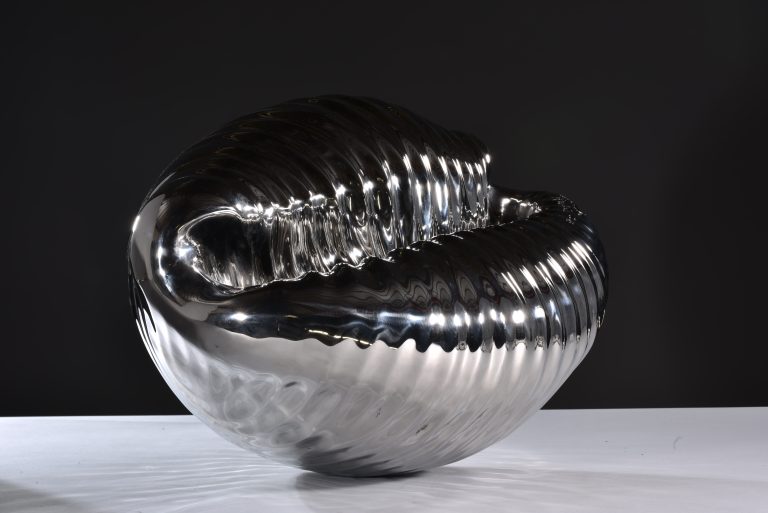 cowrie sculpture by Mackie