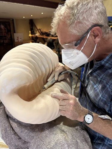 Hamish sculpting cowrie sculpture