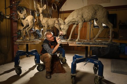 Clay models of deer sculptures