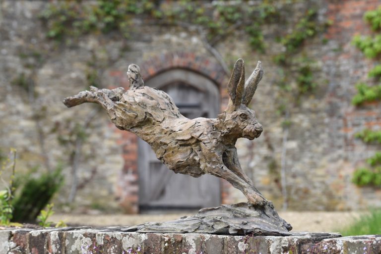 Mackie's bronze hare running