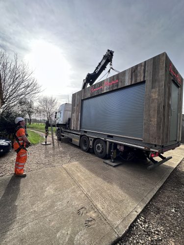 container on back of lorry