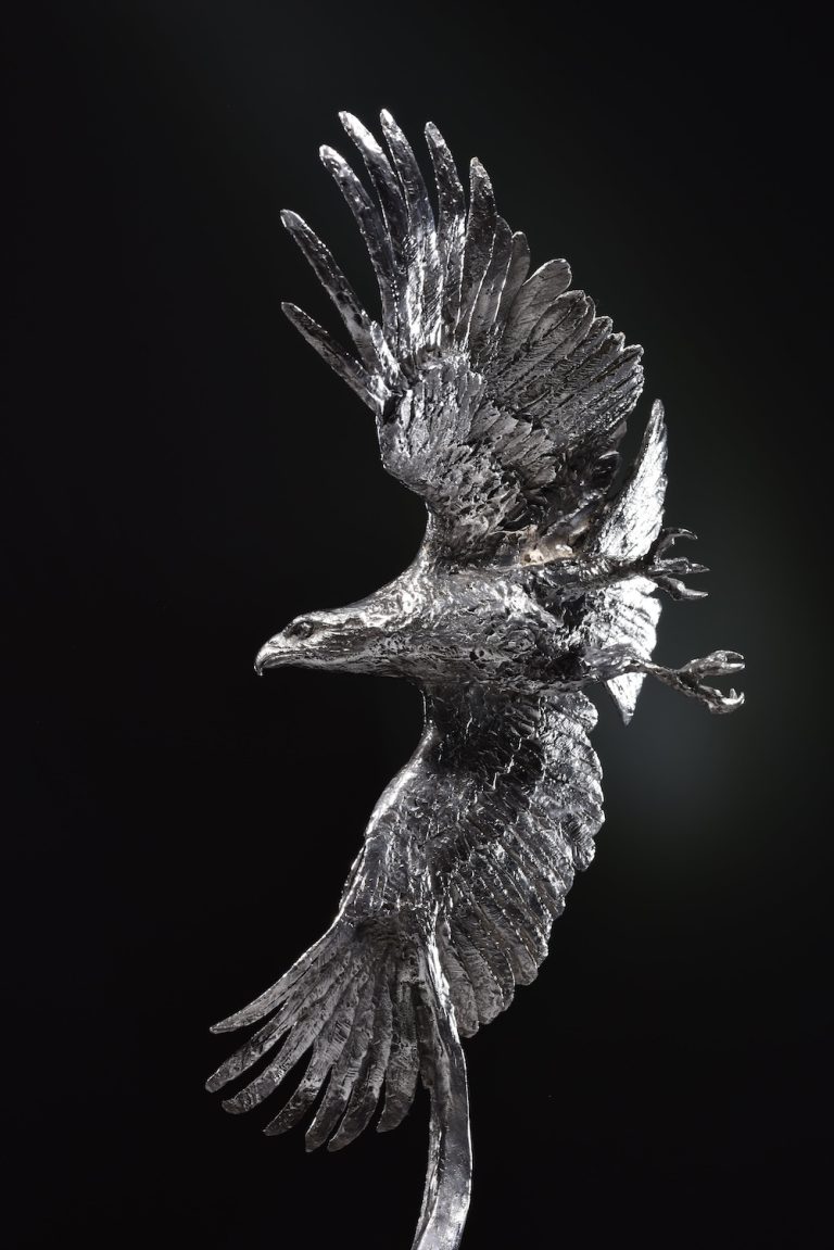 Silver bald eagle sculpture