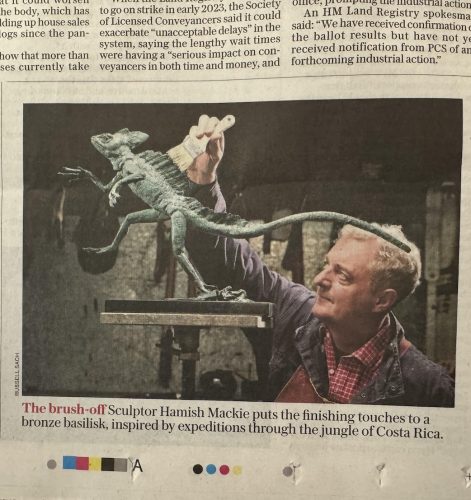 Photo from Daily Telegraph of Hamish with sculpture of Jesus Lizard