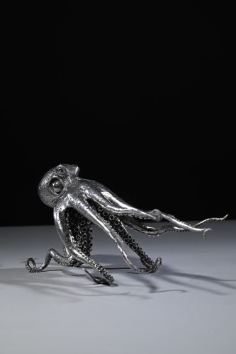 sculpture in silver of octopus