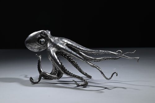 Silver sculpture of octopus