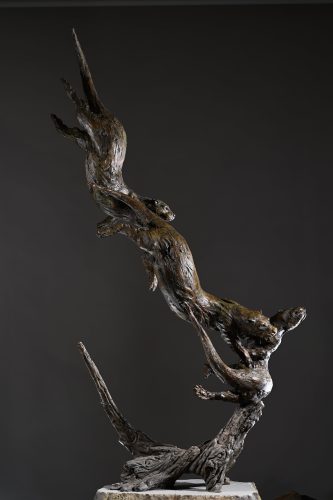 otters in bronze