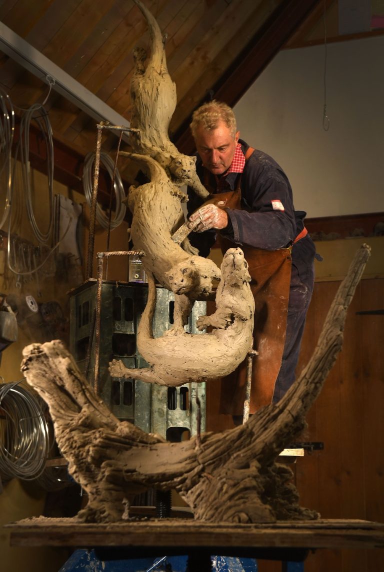 Hamish sculpting otters