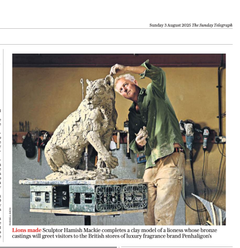 photo of Hamish sculpting a lioness