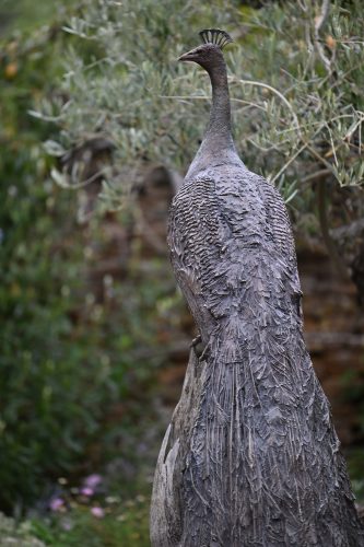 life size sculpture of peacock