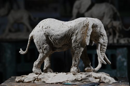 clay sculpture of bull elephant