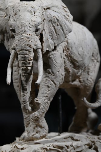 clay sculpture of elephant mother