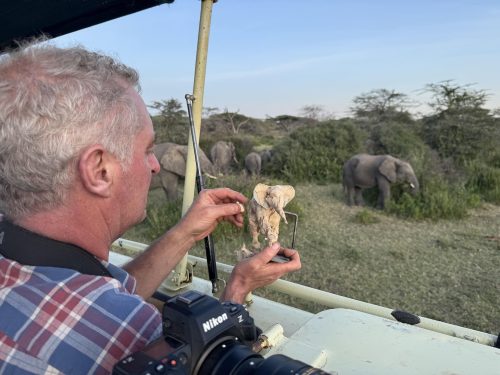 Hamish sculpting elephant in Africa