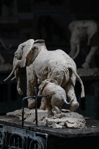 elephant mother and calf sculpture in clay