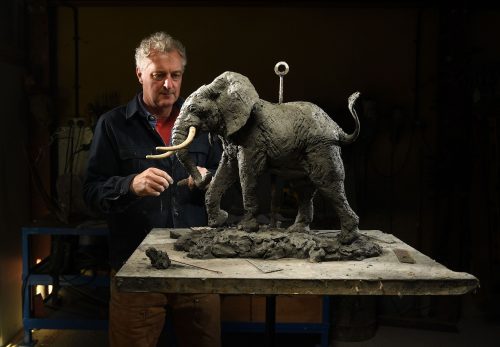 Hamish making large elephant sculpture