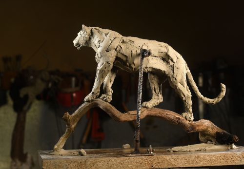 clay leopard lookout sculpture