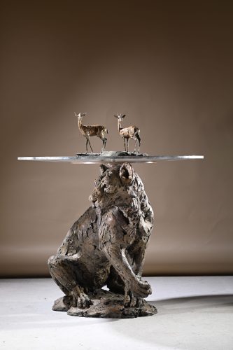 dik dik sculptures on lion table