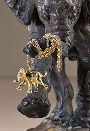 Hamish's gold elephant pendant