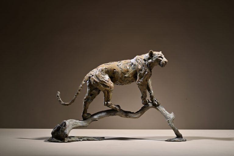 Bronze leopard look out sculpture