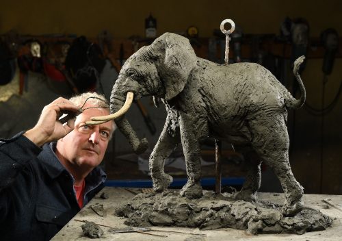Hamish making bull elephant sculpture